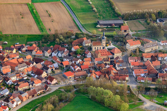 Burggut Castle Höchheim and St. Michael's Church in Höchheim in the state Bavaria, Germany