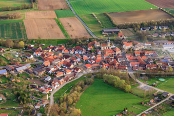 Aerial view of Burggut Castle Höchheim and St. Michael's Church in Höchheim in the state Bavaria, Germany