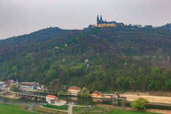 Banz Monastery with the monastery church of St. Dionysius and St. Peter on a mountain above the Main in the district Unnersdorf in Bad Staffelstein in the state Bavaria, Germany from above