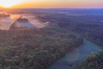 Sunrise over the Otterbach lowlands in the morning mist in Minfeld in the state Rhineland-Palatinate, Germany from above