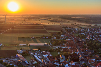 Sunrise over the main street in Minfeld in the state Rhineland-Palatinate, Germany