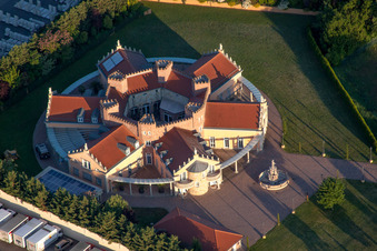 Oblique view of Star-shaped villa with battlements and castle wall in Fichtenstraße in Landau in der Pfalz in the state Rhineland-Palatinate, Germany