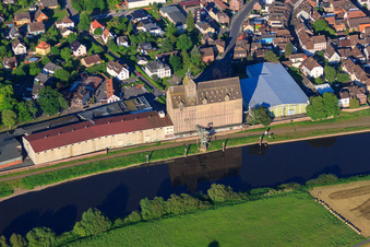 Historic harbor building of RL Rieke GmbH & Co. KG on Wallstraße on the banks of the Weser in Holzminden in the state Lower Saxony, Germany