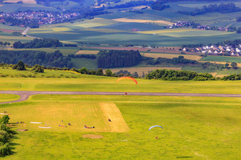 Parachute field at the Höxter-Holzminden airfield (EDVI) in the district Albaxen in Höxter in the state North Rhine-Westphalia, Germany out of the air