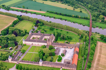 UNESCO World Heritage Site Corvey Castle on the banks of the Weser with castle restaurant, Weser-Aktivhotel-Corvey and Remtergarten State Garden Show Höxter in Höxter in the state North Rhine-Westphalia, Germany out of the air