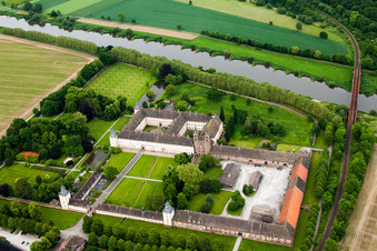 Aerial view of Complex of buildings of the monastery Schloss/Kloster Corvey (UNESCO Weltkulturerbe) in Hoexter in the state North Rhine-Westphalia, Germany