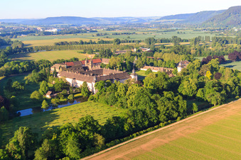 Aerial view of UNESCO World Heritage Site Corvey Castle on the banks of the Weser with Remter Garden State Garden Show Höxter in Höxter in the state North Rhine-Westphalia, Germany