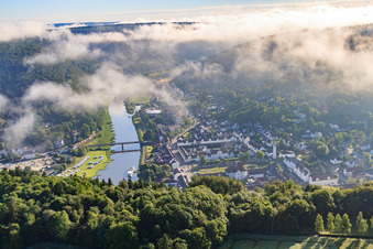 Old town and Weser Bridge under low clouds in Bad Karlshafen in the state Hesse, Germany