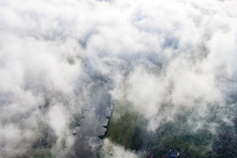 Aerial view of Clouds over the Weser Valley in Bad Karlshafen in the state Hesse, Germany