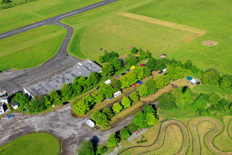 Parking lot of the airfield Höxter-Holzminden (EDVI) in the district Albaxen in Höxter in the state North Rhine-Westphalia, Germany