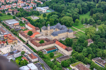 Oblique view of Castle park and castle Werneck with castle church and Albert Schweitzer House in Werneck in the state Bavaria, Germany