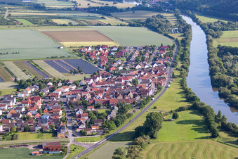 Oblique view of Village on the river bank areas of the Main river in the district Hirschfeld in Roethlein in the state Bavaria, Germany