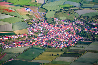 Village - view on the edge of agricultural fields and farmland in Oberaltertheim in the state Bavaria, Germany