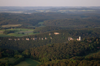 Wood and mountain landscape Albtrauf in the Swabian nightmare with the castle Bright stone in the district Unterhausen in Lichtenstein in the federal state Baden-Wurttemberg