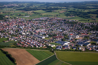 Aerial view of Village - view on the edge of agricultural fields and farmland in Laichingen in the state Baden-Wurttemberg, Germany