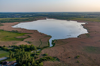 Aerial view of Federsee with stilt houses in Bad Buchau in the state Baden-Wuerttemberg, Germany