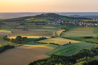 Aerial view of Village on the slopes of the Bussen, the Holy Mountain of Swabia and place of pilgrimage in the district Offingen in Uttenweiler in the state Baden-Wuerttemberg, Germany