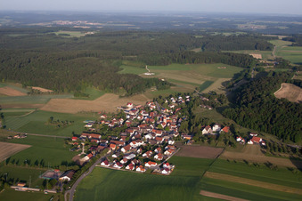Aerial view of Village - view on the edge of agricultural fields and farmland in Ehingen (Donau) in the state Baden-Wurttemberg, Germany