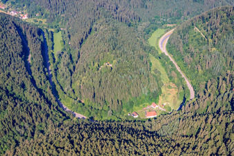 Ruins and remains of the walls of the former castle and fortress Waldeck in the Nagold valley and the Waldecker Hof retirement home surrounded by forest in the district Holzbronn in Calw in the state Baden-Wuerttemberg, Germany