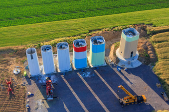 Aerial photograpy of Interlocking segments of the masts of a wind turbine before assembly in Offenbach an der Queich in the state Rhineland-Palatinate, Germany