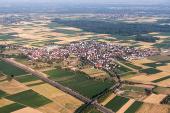 Aerial view of Village - view on the edge of agricultural fields and farmland in Kuerzell in the state Baden-Wurttemberg, Germany
