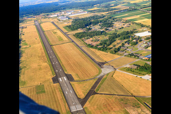 Aerial view of Runway of the Lahrer Flugbetriebs GmbH airfield in the district Schuttern in Friesenheim in the state Baden-Wuerttemberg, Germany