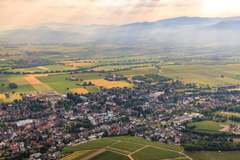View of the town from the southwest with St. Bartholomew in Heitersheim in the state Baden-Wuerttemberg, Germany