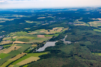 Gederner See with campsite and beach at the edge of the forest in Gedern in the state Hesse, Germany