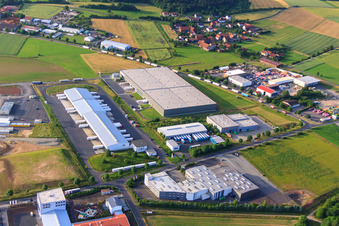 Aerial view of Werner-von-Siemens-Straße industrial estate with VTL Networked Transport Logistics GmbH in the district Besges in Fulda in the state Hesse, Germany
