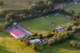 Aerial view of Football field with tent camp in the district Burkhards in Schotten in the state Hesse, Germany