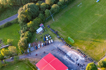 Aerial photograpy of Football field with tent camp in the district Burkhards in Schotten in the state Hesse, Germany