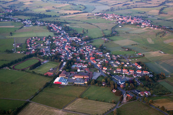 Village - view on the edge of agricultural fields and farmland in Grebenhain in the state Hesse, Germany