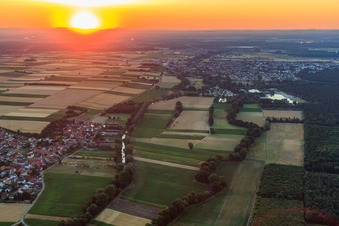 View of the town from the southwest at sunset in Herxheimweyher in the state Rhineland-Palatinate, Germany