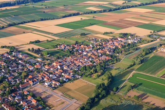 Overview of the town from the northeast with the Protestant Church in Freisbach in the state Rhineland-Palatinate, Germany