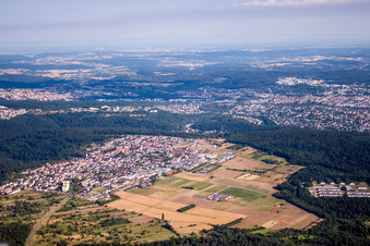 Village - view on the edge of agricultural fields and farmland in the nothern black forest in the district Huchenfeld in Pforzheim in the state Baden-Wurttemberg, Germany