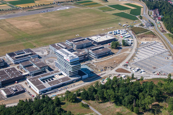 Aerial view of Research building and office complex of Robert Bosch GmbH Zentrum fuer Forschung and Vorausentwicklung at glider airfield in Renningen in the state Baden-Wurttemberg, Germany