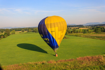 Bird's eye view of Landing of a hot air balloon D-OTKA in Erlenbach bei Kandel in the state Rhineland-Palatinate, Germany