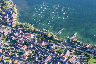 Pleasure boat marina with docks and moorings on the shore area of the lake of Constance Bodensee in Allensbach in the state Baden-Wurttemberg
