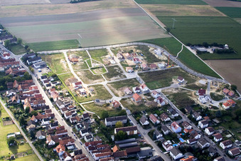 Construction sites for new construction residential area of detached housing estate Am Hoehenweg in Kandel in the state Rhineland-Palatinate seen from above