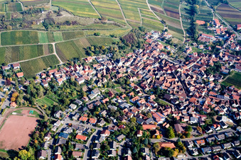 Village - view on the edge of vine yards and the nature reserve and chapel Kleine Kalmit in Ilbesheim bei Landau in der Pfalz in the state Rhineland-Palatinate