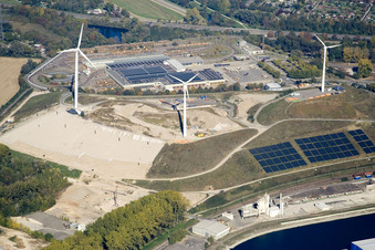 Wind turbines on the waste mountain of the West landfill in the district Knielingen in Karlsruhe in the state Baden-Wuerttemberg, Germany