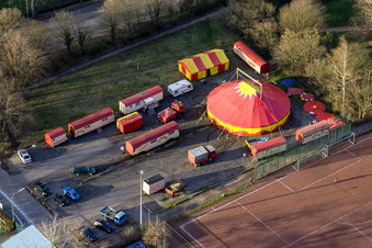 Circus Weisheit at the sports field in Kandel in the state Rhineland-Palatinate, Germany from the plane