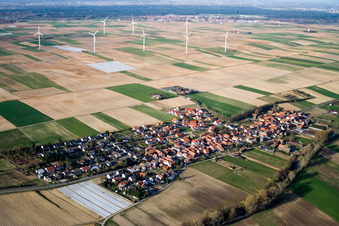 Wind turbine windmills on a field in Herxheimweyher in the state Rhineland-Palatinate