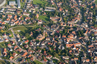 Aerial photograpy of Church in the village center in the district Rheinbischofsheim in Rheinau in the state Baden-Wuerttemberg, Germany