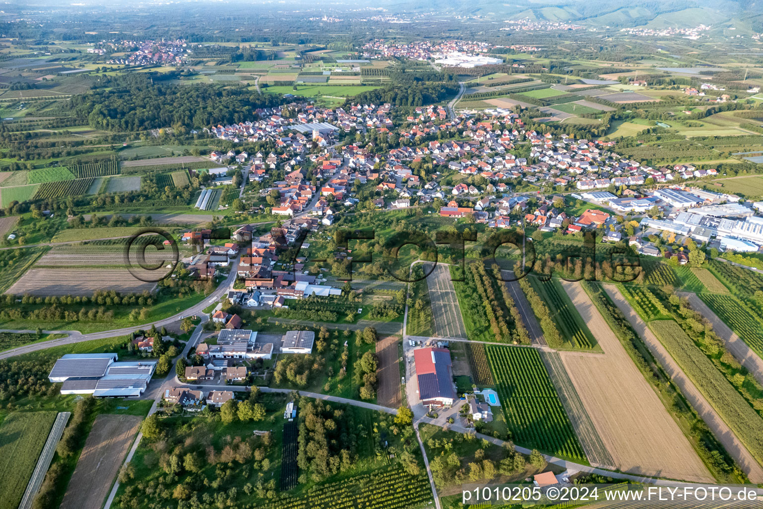 Aerial view of Village - view on the edge of agricultural fields and farmland in Zusenhofen in the state Baden-Wurttemberg, Germany