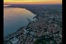Sunrise on Lake Garda in Desenzano del Garda in the state Brescia, Italy