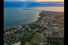 Sirmione peninsula on Lake Garda in the morning light in Desenzano del Garda in the state Brescia, Italy