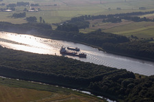 Ride of freight ships in Nord-Ostsee-Kanal in Kudensee in the state Schleswig-Holstein, Germany