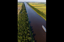 Aerial view of Channel flow and river banks of the waterway shipping Nordostseekanal in Buchholz in the state Schleswig-Holstein, Germany