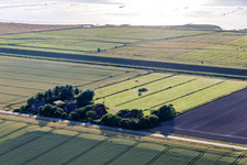 Former dike keepers' farms on Schülpersieler Straße in Wesselburenerkoog in the state Schleswig Holstein, Germany from the drone perspective